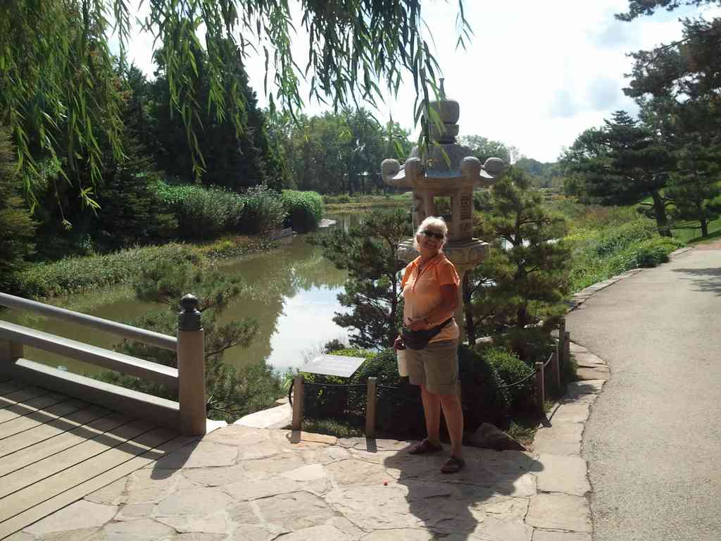 Pattie about to cross the bridge to the Japanese gardens.