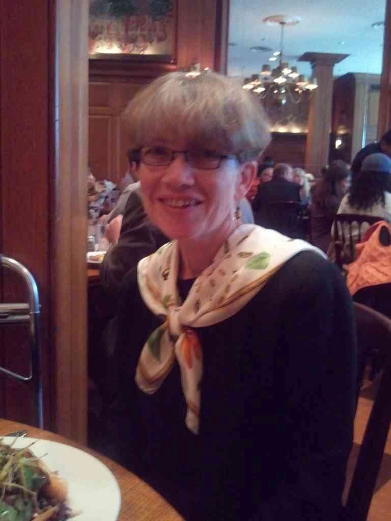 My very cute cousin Karen enjoying the Panko Crusted Goat Cheese salad.