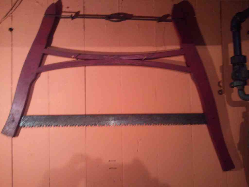 Uncle Eddy had this saw hanging on the wall in his basement. I couldn't resist taking a picture of it.