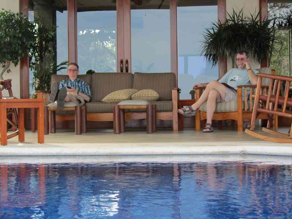 Jeff and I don't enjoy the water quite as much as Dee Dee, so we relaxed at the edge. The best part? A continuous flow of cold drinks delivered right to us by Olman!