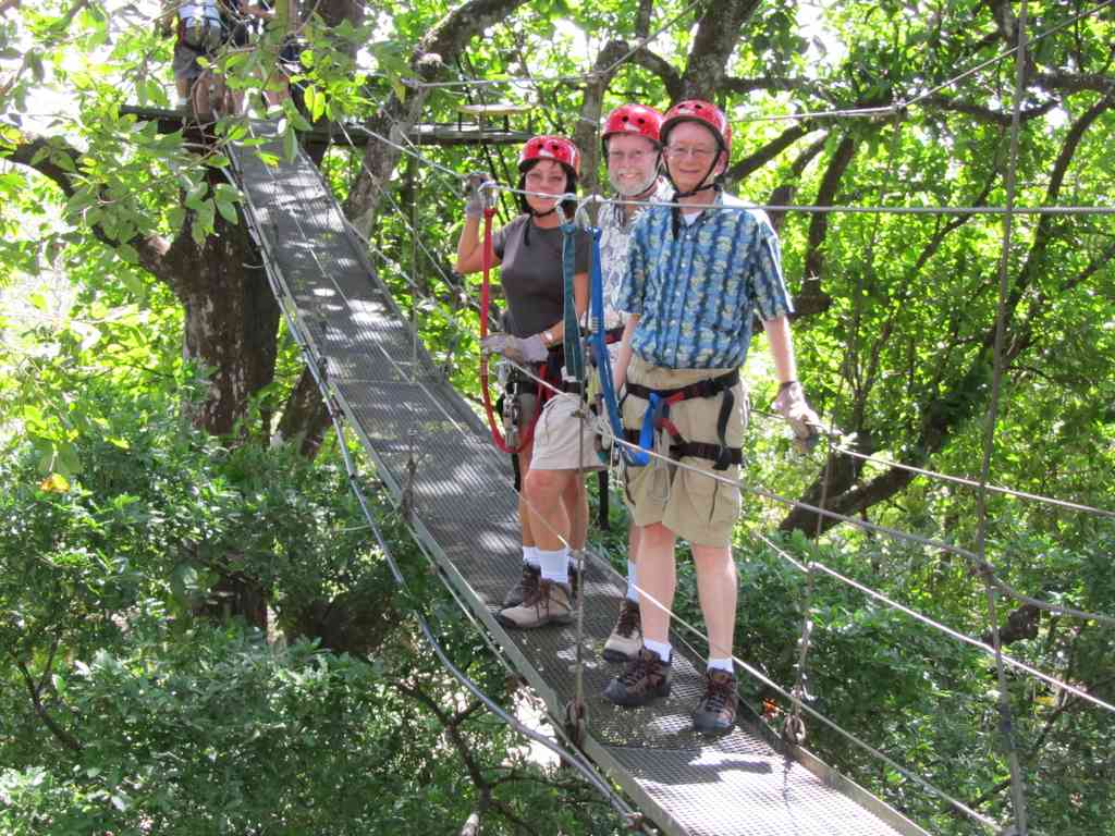 Left to right: Dee Dee, Jeff, and Charles (me)! We are standing on one of the suspension bridges between zip lines.