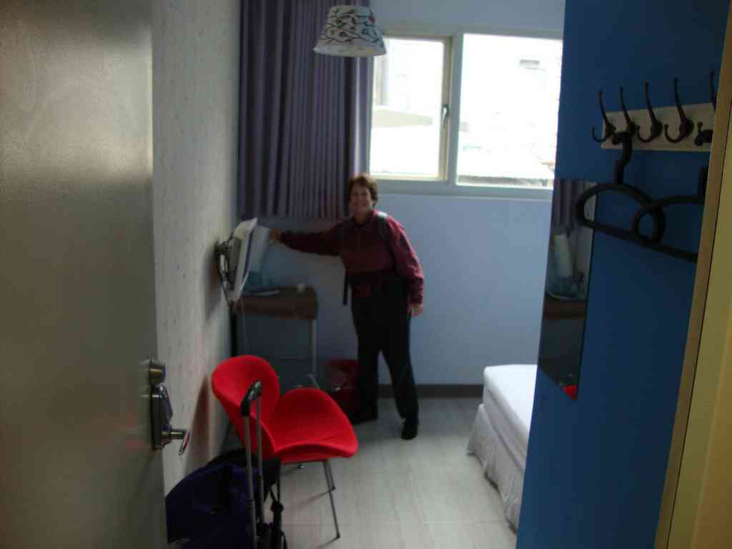 Wow! What a bright, efficiently tiny room! It was only a few short steps from the doorway to the refrigerator.