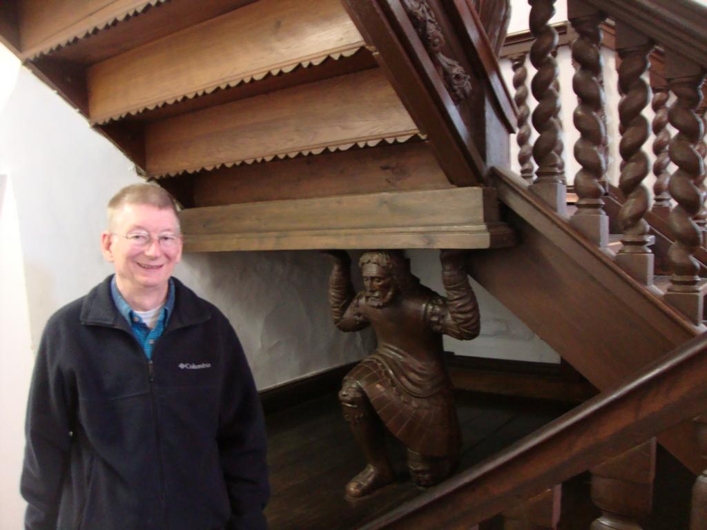 Notice the carved wooden man tucked under the staircase, appearing to hold it up! We found this to be a very interesting detail.