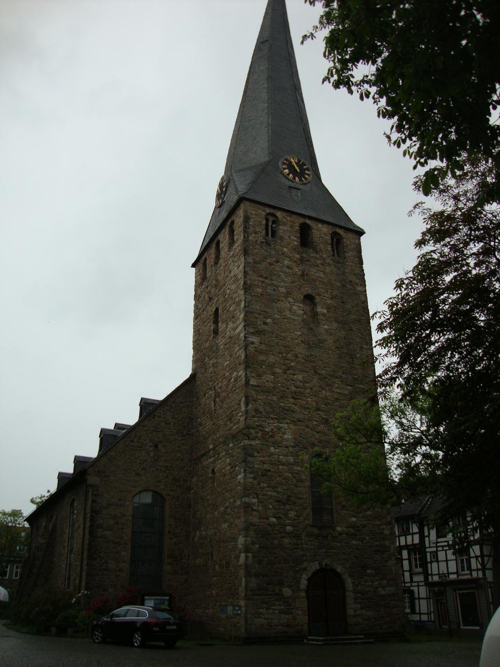 St. George's Church. Originally built as a Romanesque church around 1200, it burned down in 1424, was rebuilt as gothic, and finally converted to neo-classical around 1810.