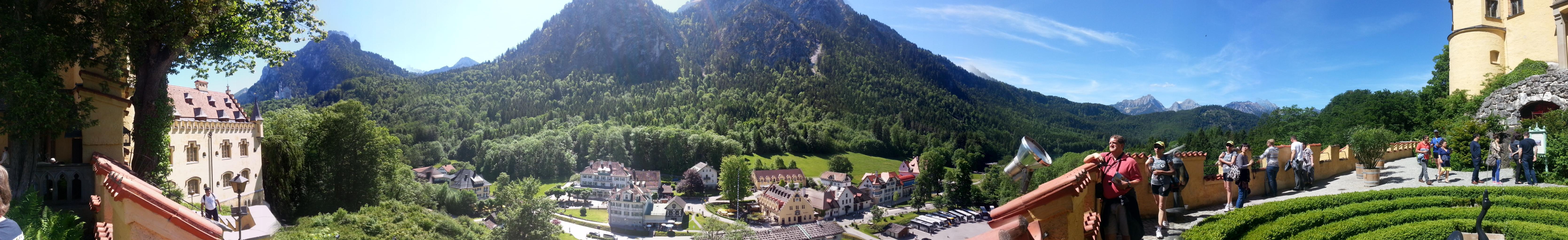 A panoramic view of the village below. If you look closely at the left side, right below the mountain peak, you can spot Neuschwanstein in the distance!