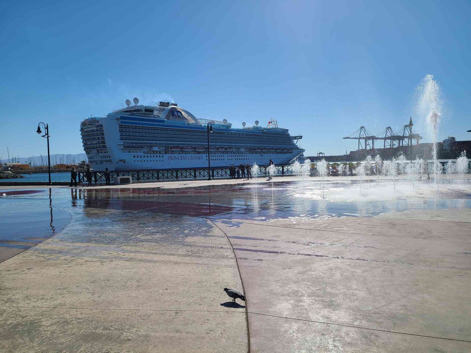 The wind was incredibly strong! The fountain water was spraying completely across the sidewalk. We had to sprint through to avoid getting soaked. Hmm, maybe we should have taken that shuttle back! 😁