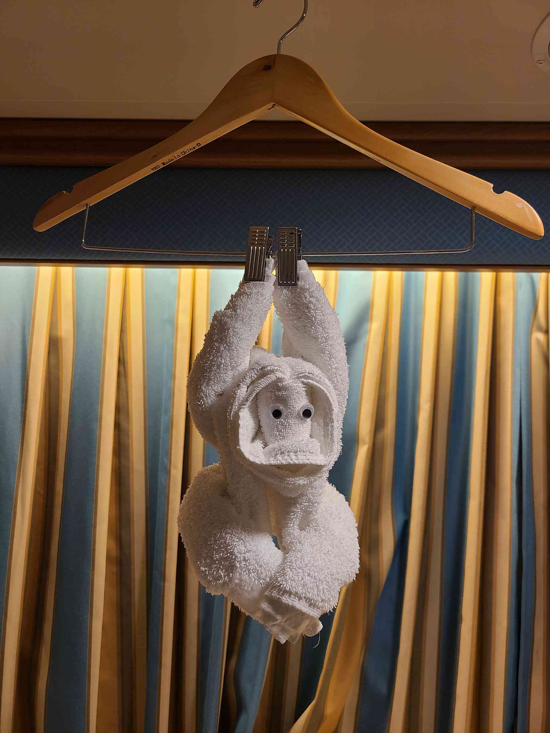 The monkey hanging from the ceiling was incredibly cute.