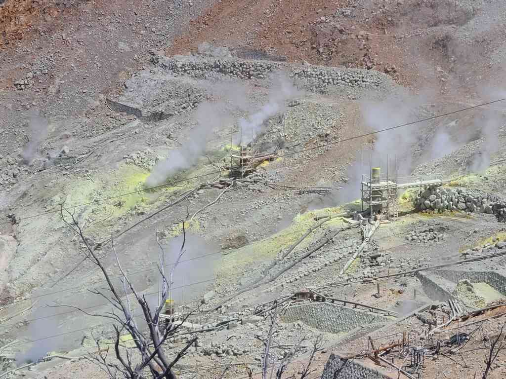 Sulphur spewing onto the ground from the active volcano beneath the surface.